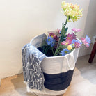 Woven cotton storage baskets in three sizes