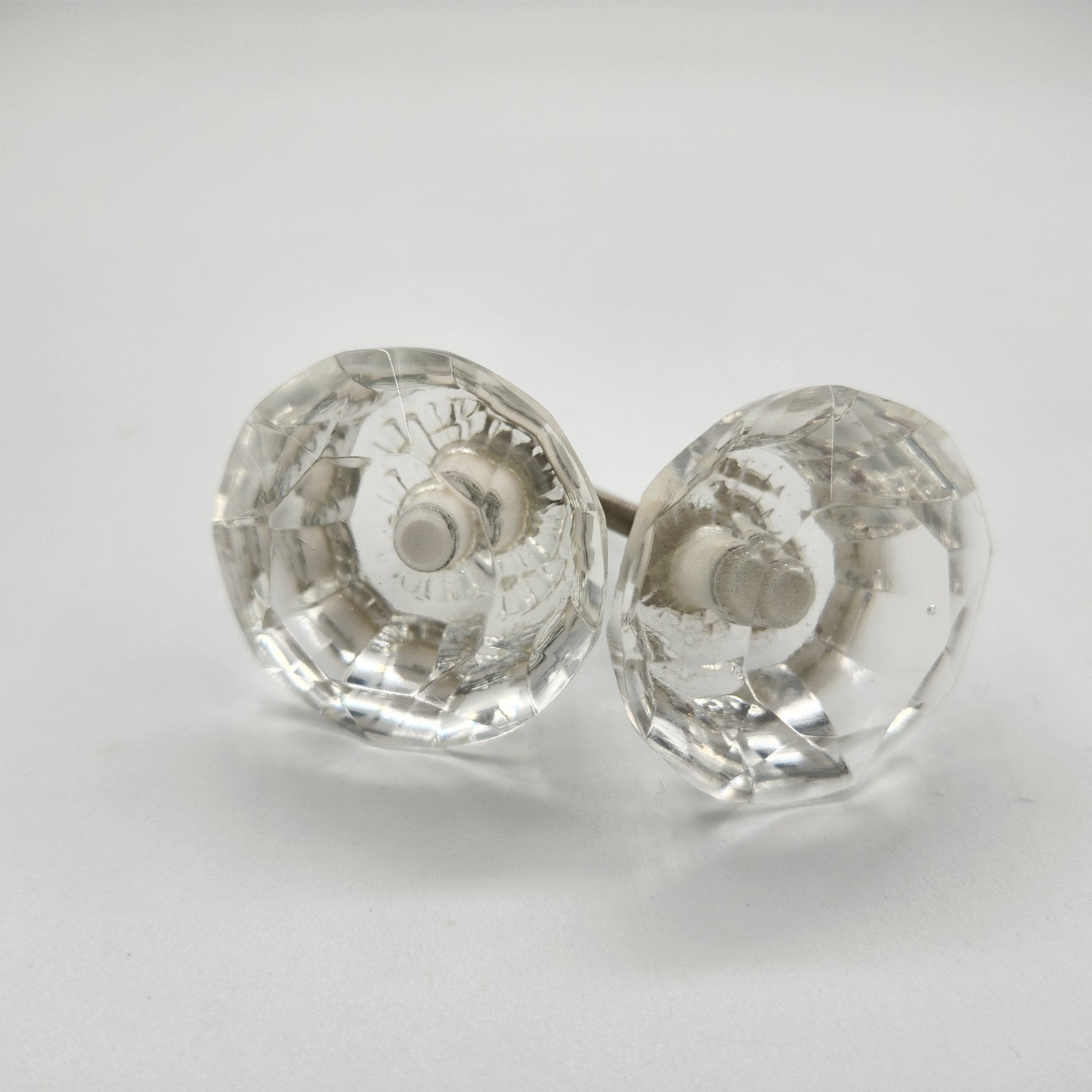 Set of 2 small faceted glass door knobs