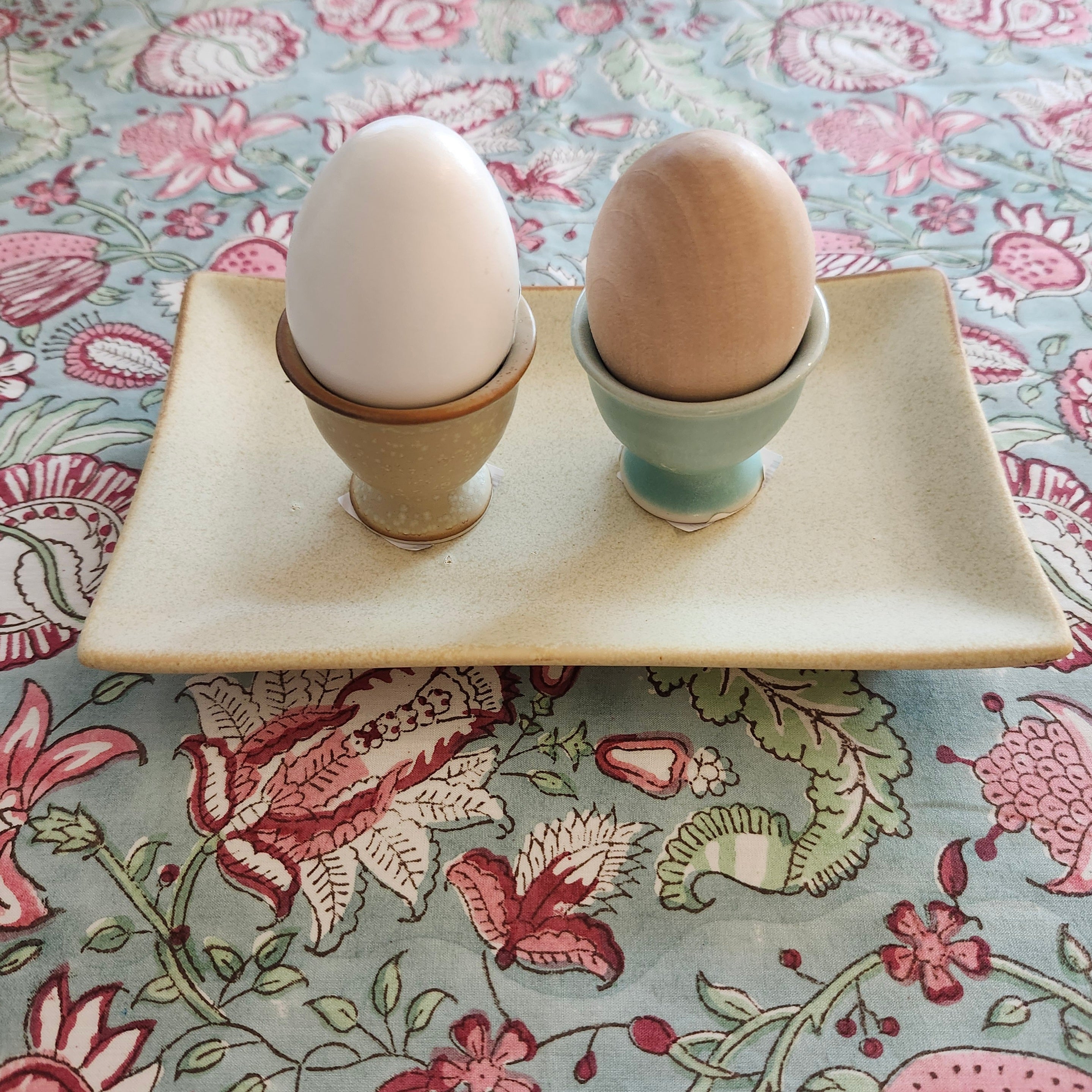 Ceramic egg cups in pastel colours, styled view, 5 cm diameter x 5 cm