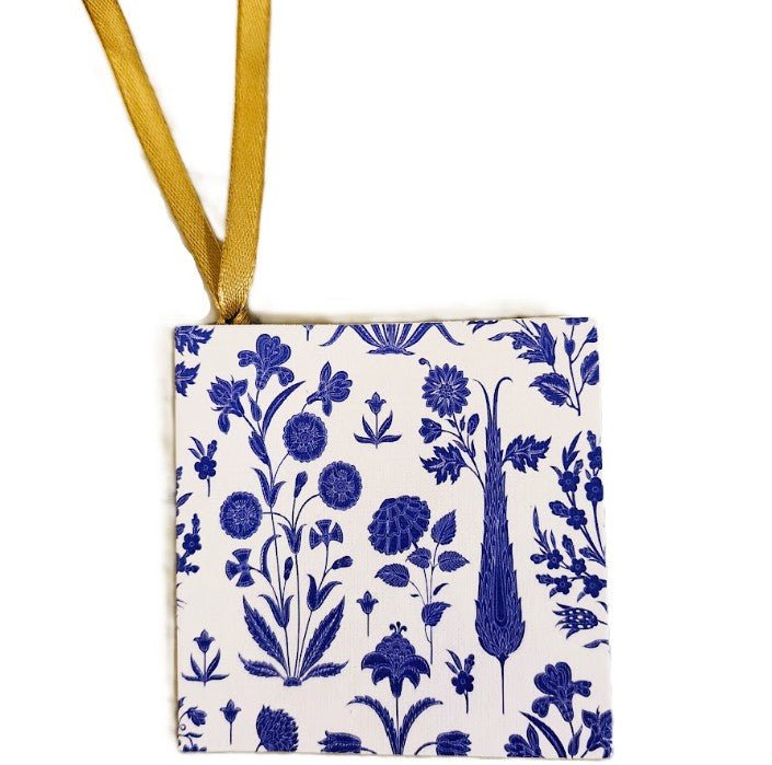 Blue and white printed card gift tag, 3 inches square, one of the assorted styles with a gold ribbon.