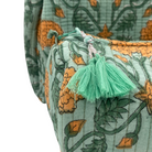 Marigold block-print cotton wash bag with a tassel
