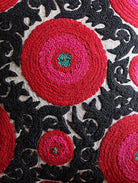 Suzani Balqash linen cushion, detail of needlework