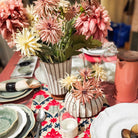 Salon high ribbed vase in putty, fluted terracotta, styled view