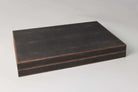 Seal brown faux shagreen backgammon board, open showing midnight blue velvet storage sections