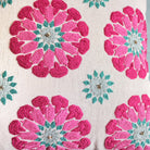 Suzani Butah Motif linen cushion, pink and turquoise needlework