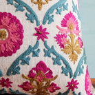 Suzani Farkhand linen cushion with floral trellis in pink, teal and mustard, 45 x 45cm