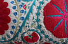 Suzani Fergana linen cushion, styled