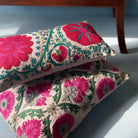 Suzani Firozi Green linen cushion, styled view