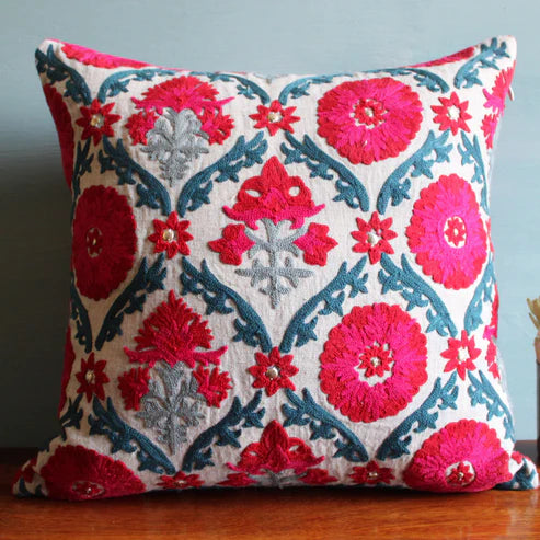 Suzani Niksaar linen cushion with lattice embroidery in red, pink and blue, 45 x 45cm
