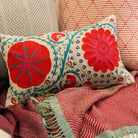 Warm red handwoven silk and linen throw, styled, India