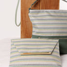 Ceannis envelope bag in green stripes, sleek envelope design with magnet closure