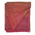 Coral red handwoven striped throw, silk and linen, styled