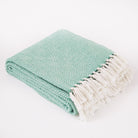 Aqua diamond-pattern blanket by Weaver Green, made from recycled plastic, 230 x 130 cm