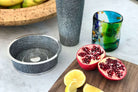 Charcoal faux shagreen wine coasters by Forwood Design, set of two, styled on a dining table