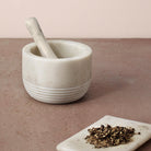White marble mortar and pestle, handcrafted, detail
