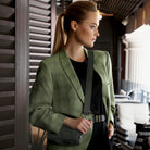 Braided iPhone shoulder bag in green vegan leather with detachable straps