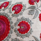 Suzani Red Butah rectangular linen cushion, close view of embroidery