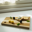 Asymmetric teak cheese and bread board, detail
