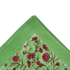 Mint green block-print tablecloth with deep pink flowers