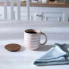 Blush pink striped ceramic mug with a wooden lid coaster, 250 ml