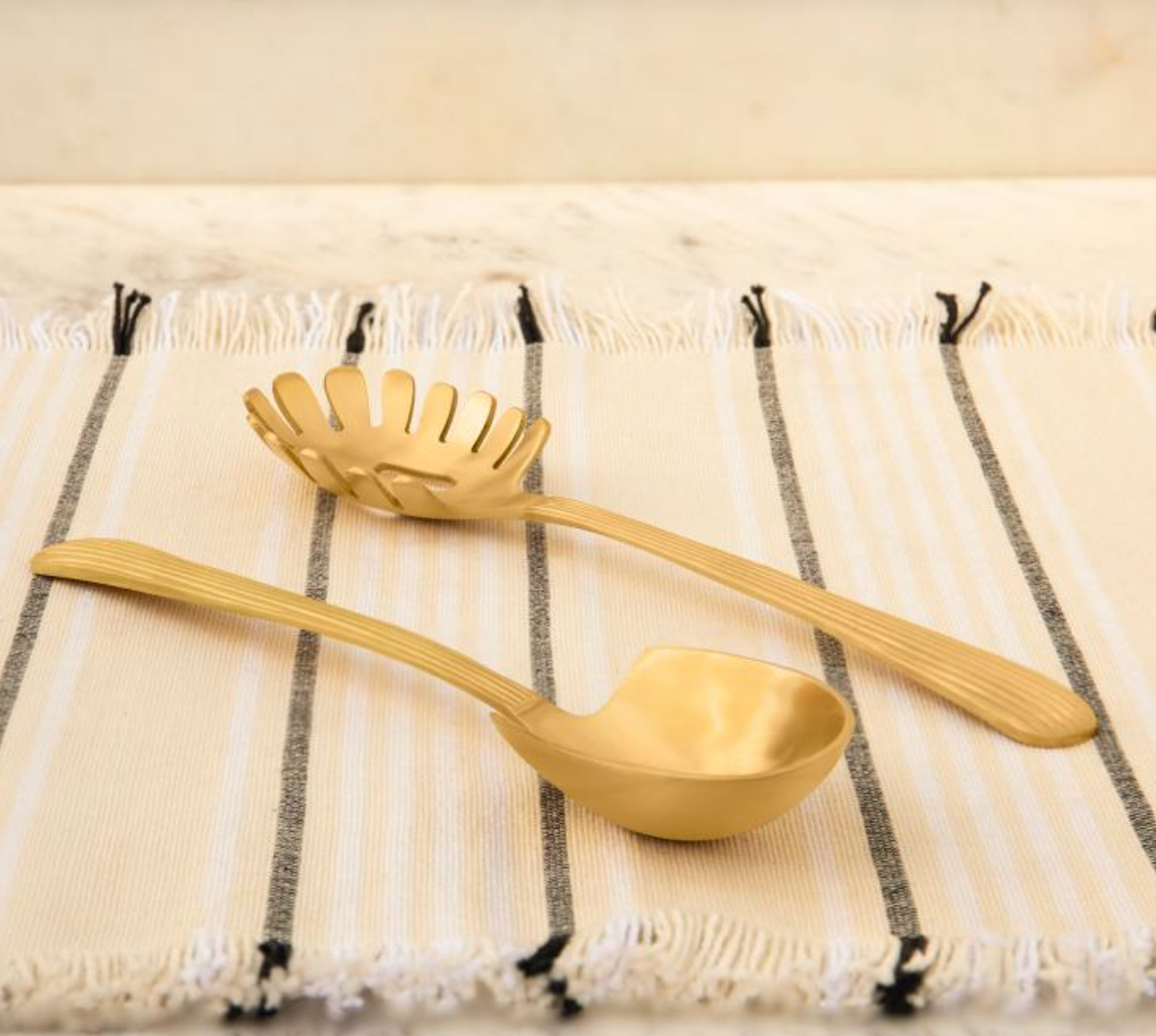 Brass ladle set with a matte gold finish