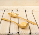 Brass ladle set with a matte gold finish