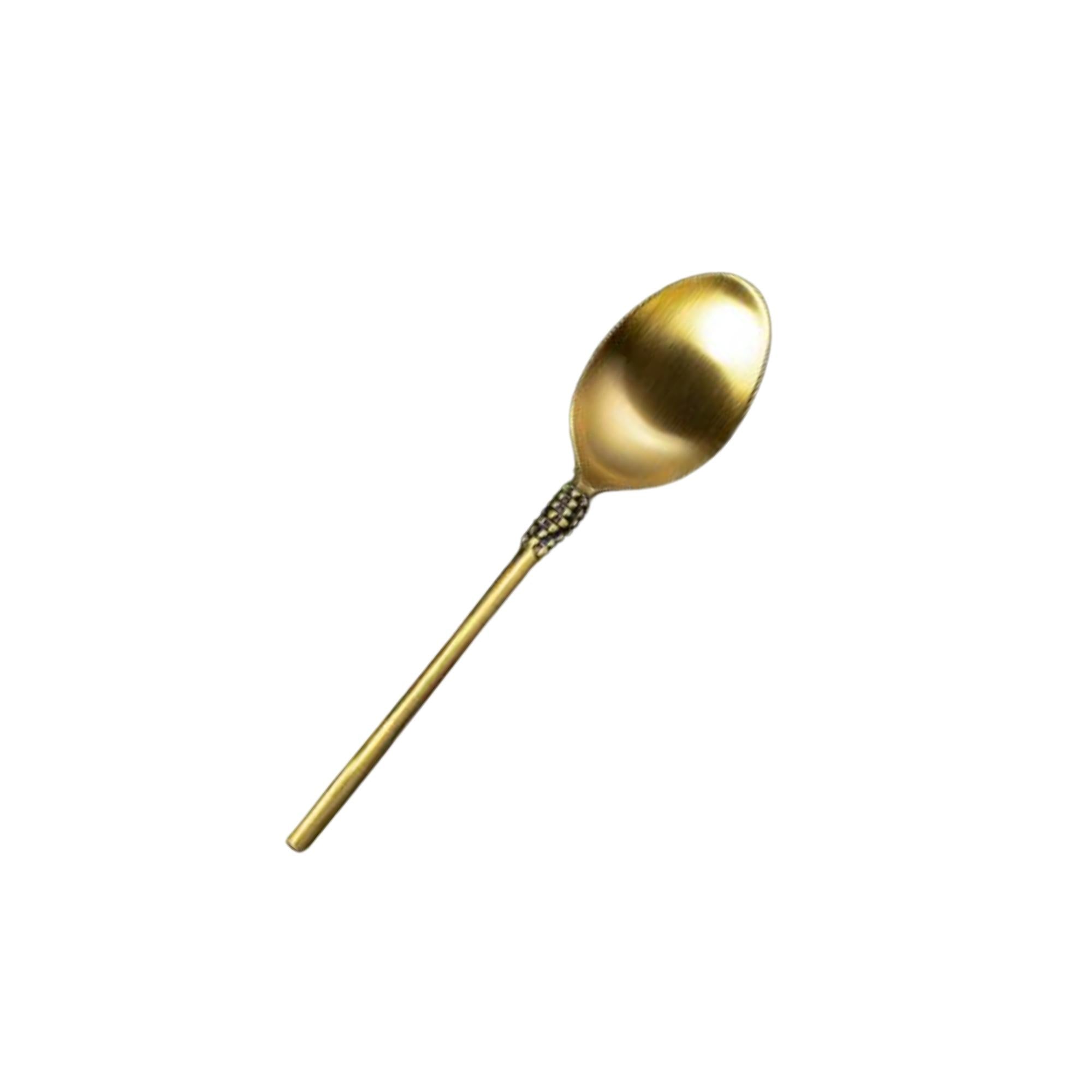 Brass table spoon with gold matte finish, handcrafted, detail view