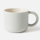 Cafe stoneware mug in duck egg blue with linear detailing