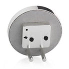 Round chiffon and silver enamel alarm clock, grey velvet backing, side view