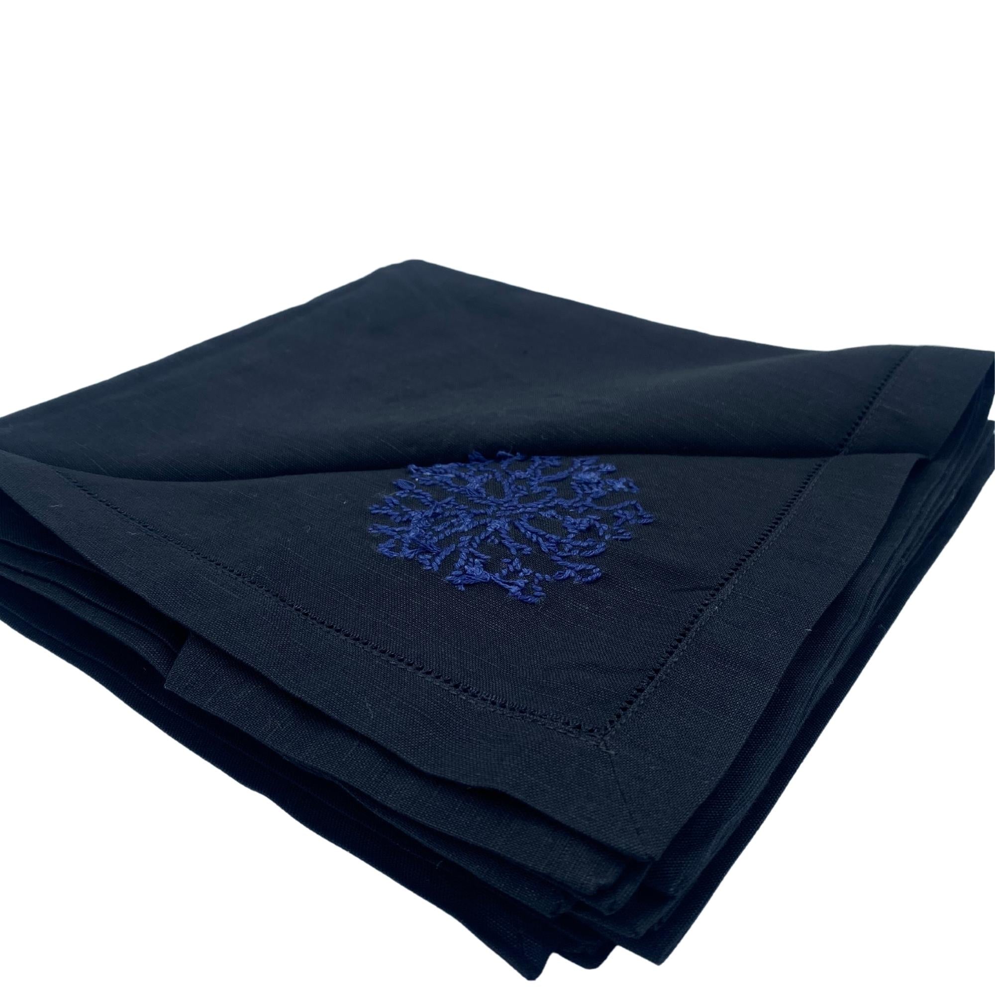 Coral motif hand embroidered black linen napkins, detail view