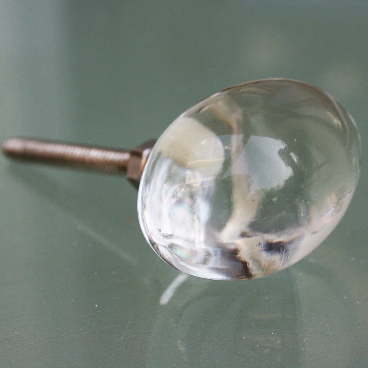 Set of 2 egg-shaped glass door knobs, 40 mm