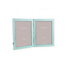 Enamel double frame in blue by Addison Ross, holds two 5 x 7 inch portraits in portrait