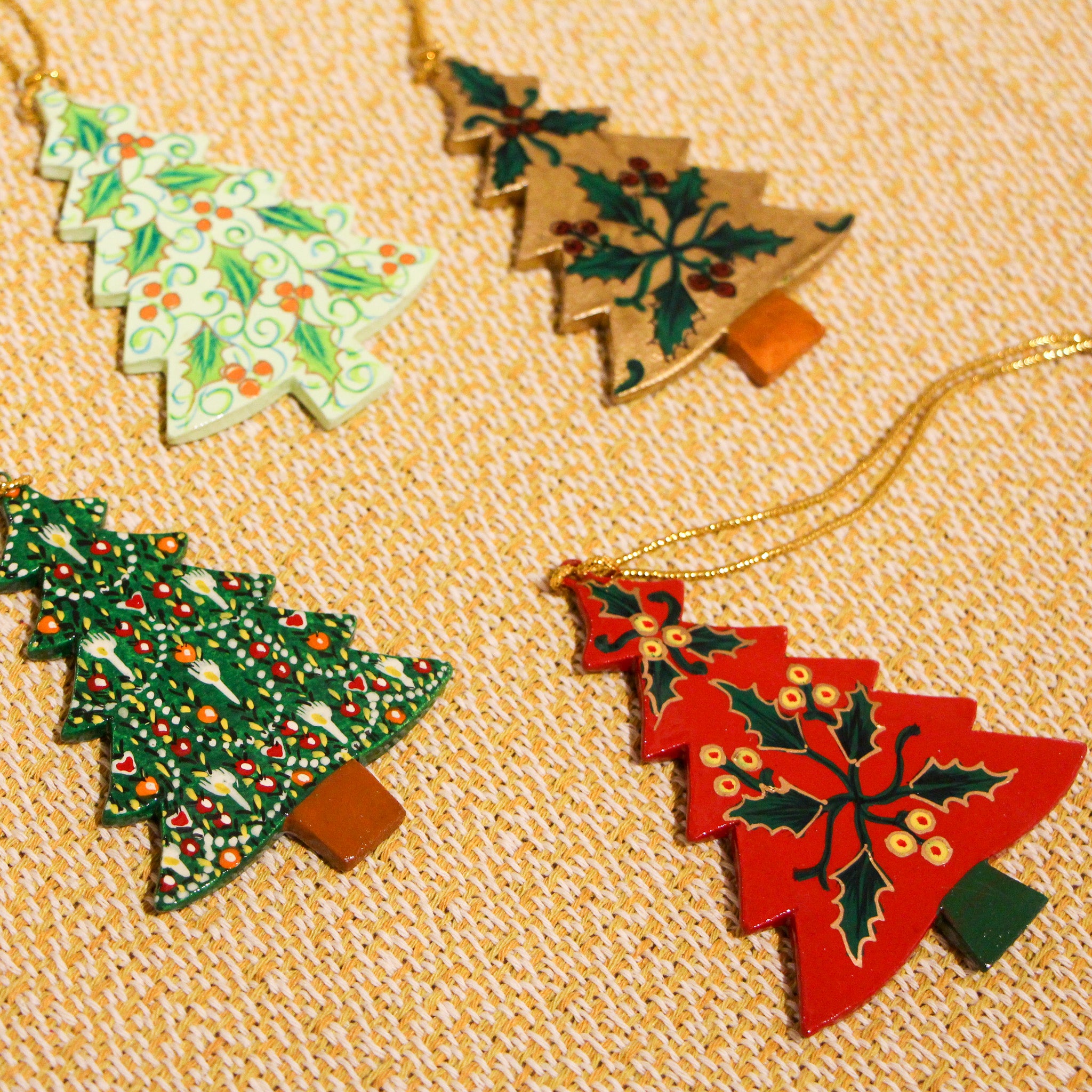 Flat papier mache Christmas trees, hand-painted holly design, handmade in India