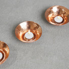 Hand-beaten copper Glimmer tea light holder, 12 x 4.5 cm, handmade in India