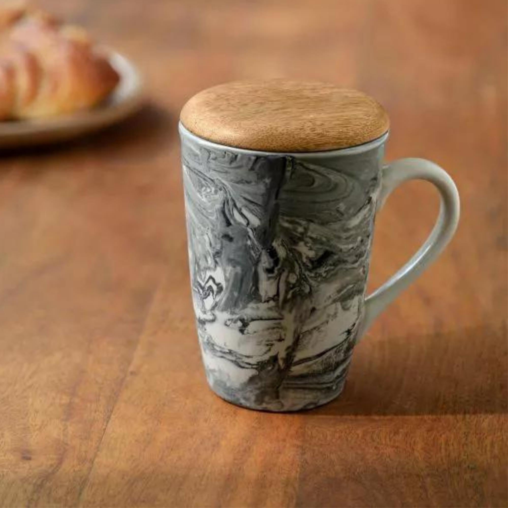 Hand-marbled carbon tall coffee mug with a wooden lid