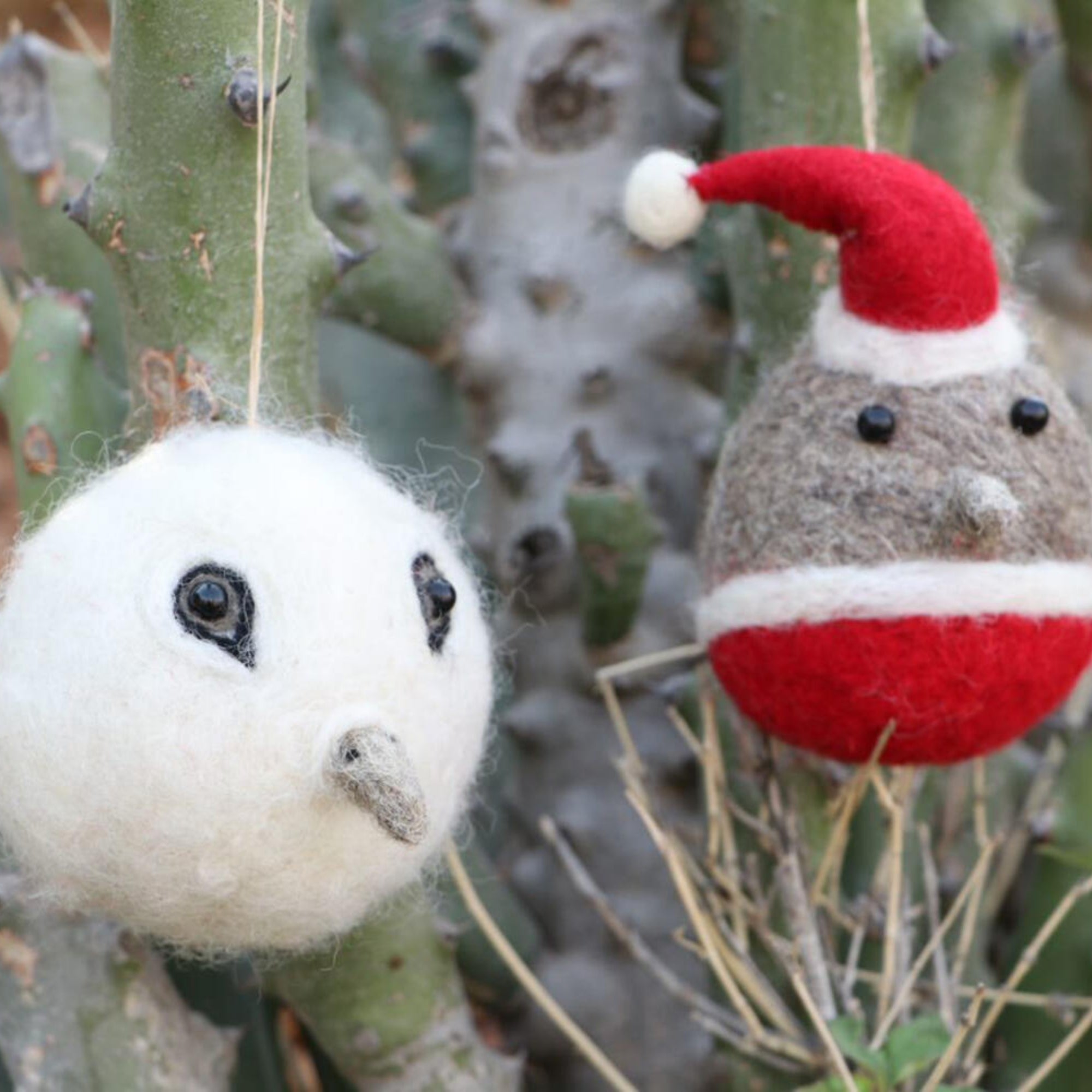 Hand-stitched felt robin and owl, detail, India