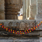 Handwoven felt pom-pom garland in red, orange and yellow, 120 cm, Jaipur
