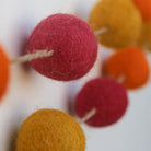 Orange felt pom-pom garland, handmade in Jaipur