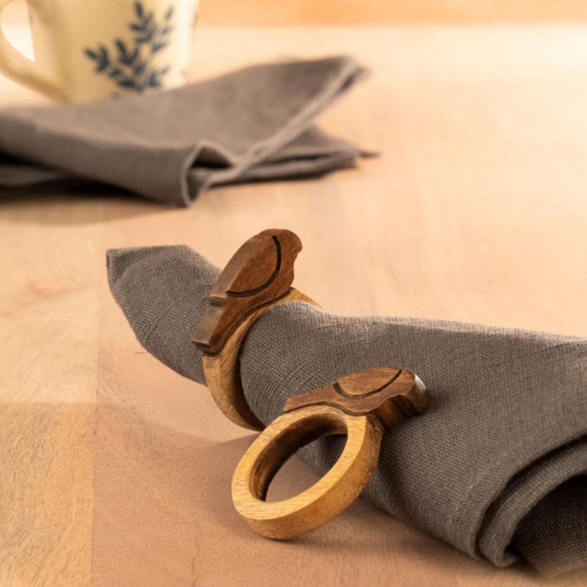 Bird-carved mango wood napkin rings, set of two, handcrafted, detail view