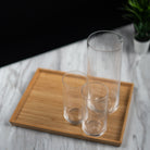 Optic carafe in clear mouth-blown glass, subtle ribbed texture, detail view