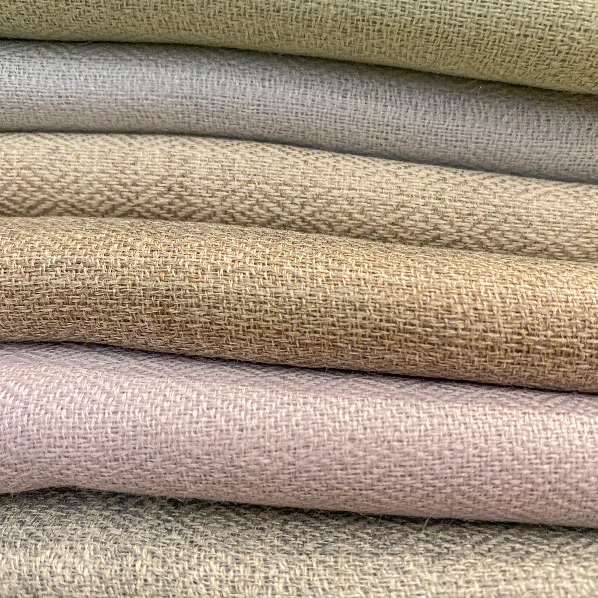 Detail of a plain 100% pashmina shawl showing the fine soft weave, available in a choice of 22 colours