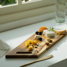 Rectangular teak cheese and bread board, detail