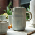 Saan ceramic jug, hand-painted blue chequered weave on eggshell white, 1000ml