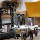 Zebra Mandarin Majorelle candle in black and white zebra-stripe ceramic pot, mandarin orange scent