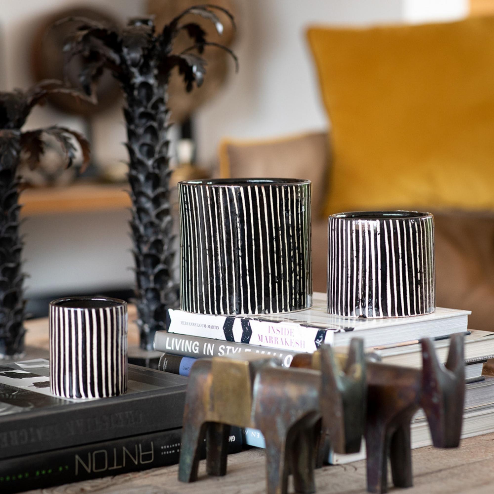 Zebra Mandarin Majorelle candle in black and white zebra-stripe ceramic pot, mandarin orange scent
