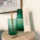 Set of bamboo drinking straws with a cleaning brush