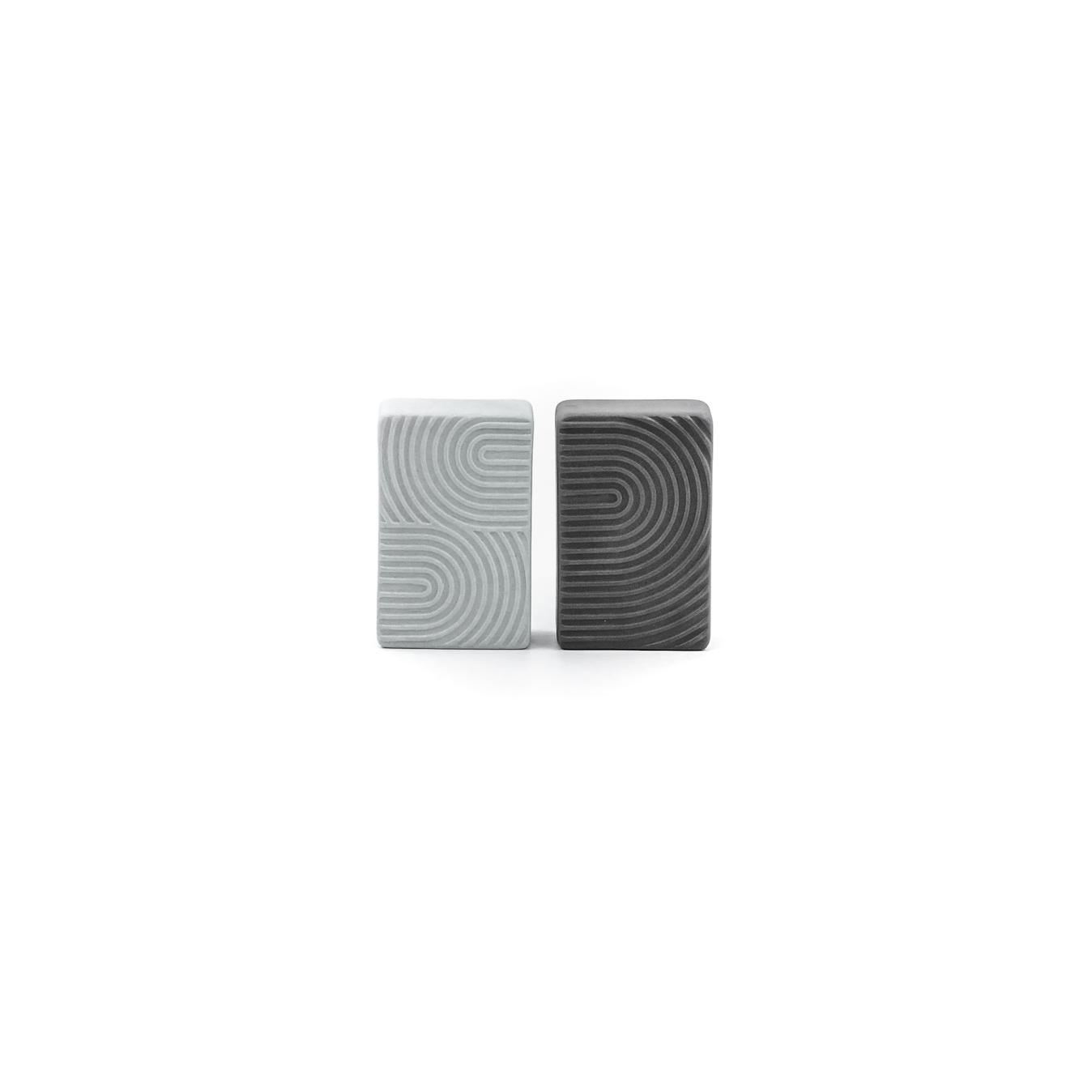 Silo porcelain salt and pepper shakers, light and dark, side view