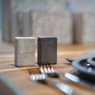 Silo porcelain salt and pepper shakers, light and dark with textured S and P letters