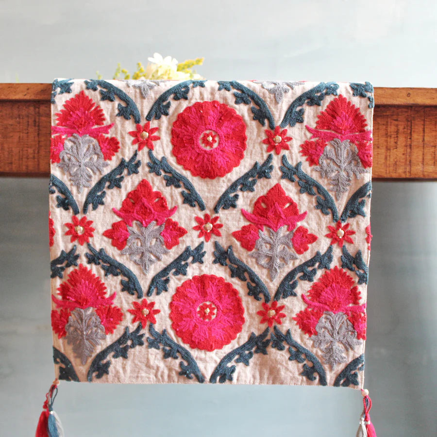 Suzani Niksaar linen table runner, detail of embroidery