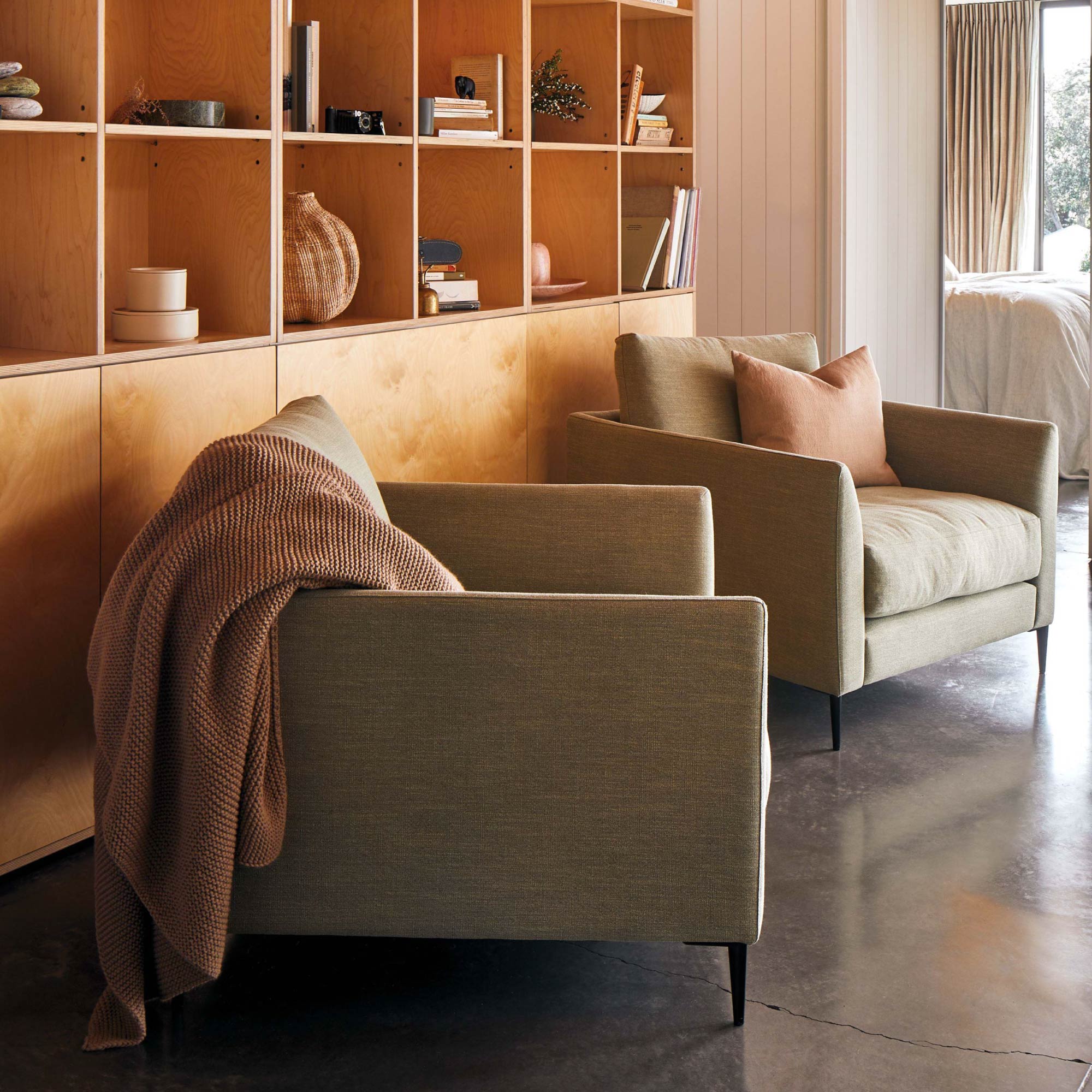 Purl knit throw in walnut wool, warm and earthy, styled